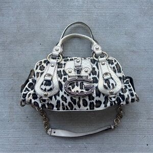 Vintage Guess Cheetah Print Handbag with Leather and Metal Accents.